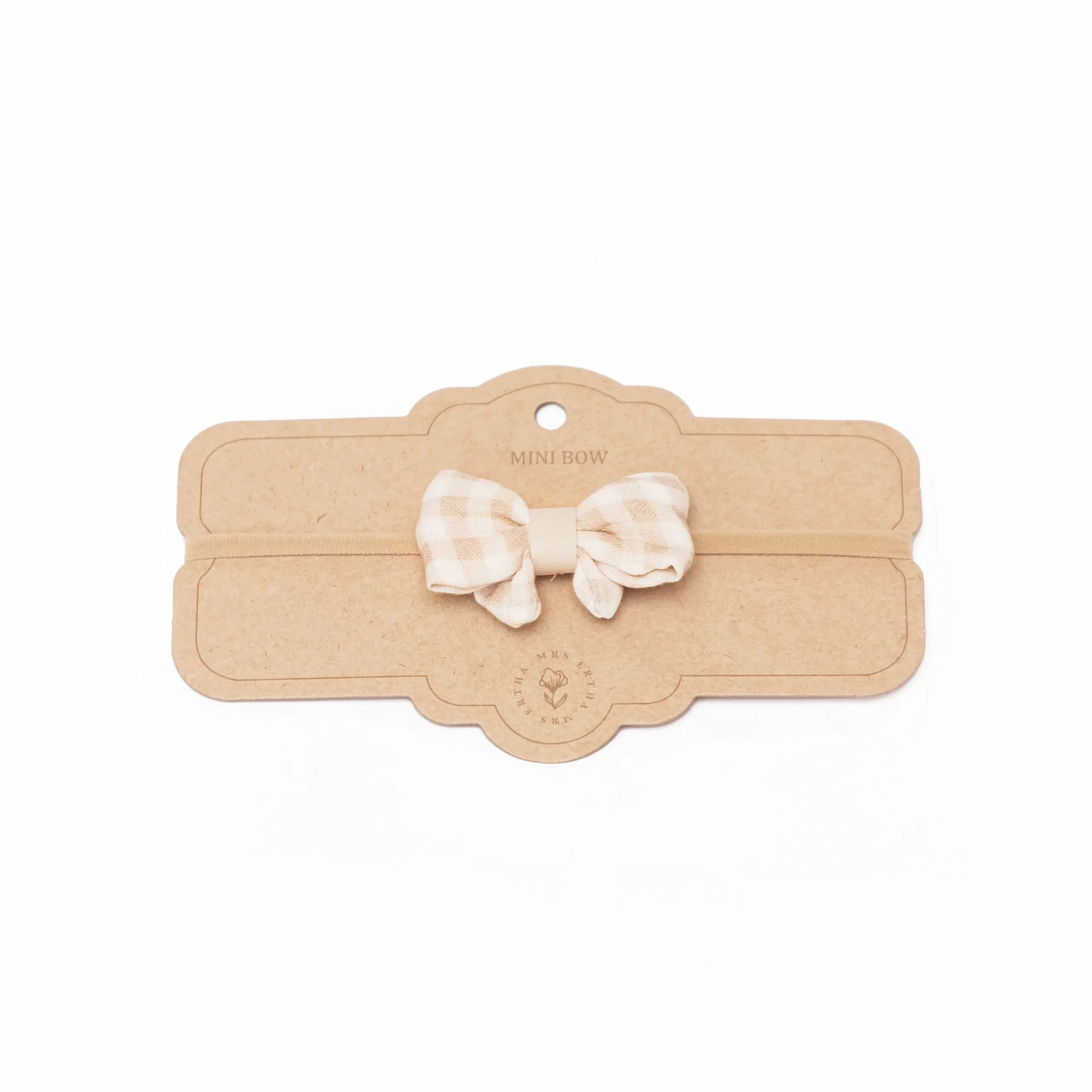 Squares_f2da210c-46c5-4b8f-8f2b-6fa6176690ec Mrs Ertha Traka za kosu s mašnom - Soft Squares - Image 1