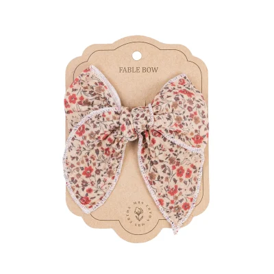 Mrs Ertha Scrunchies ukrasna gumica sa mašnom – Magic Garden